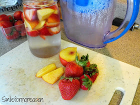 strawberries and nectarines in water