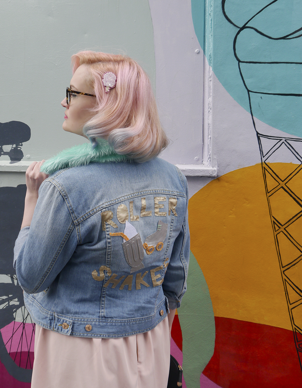 Leather and faux fur embellished oversized denim jacket Pink haired fashion blogger Kimberley from Wardrobe Converations with candy coloured hair and customised retro denim jacket with Roller Skates embellishment on back