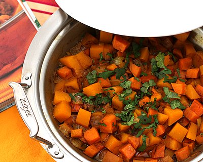 Sweet Potato & Butternut Squash Tagine ♥ A Veggie Venture, colorful vegetables married with Moroccan spices, cooked in a tagine or shallow casserole to serve tableside. Vegan. Weight Watchers Friendly.