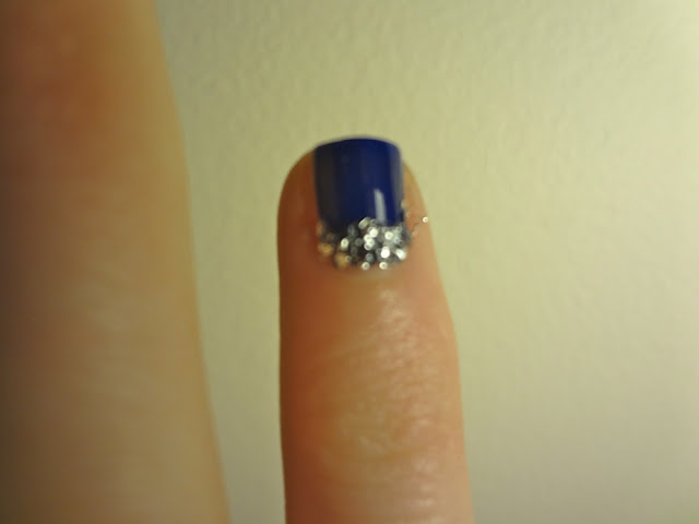 navy blue polish with silver glitter