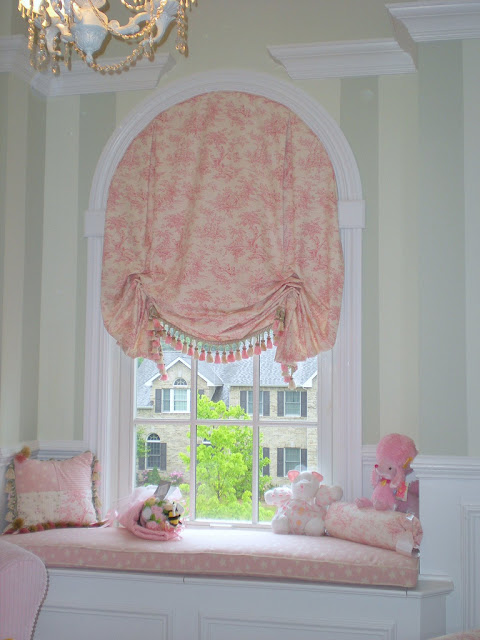 arch window treatment: pink window curtain and seat arch window treatment: pink window curtain and seat