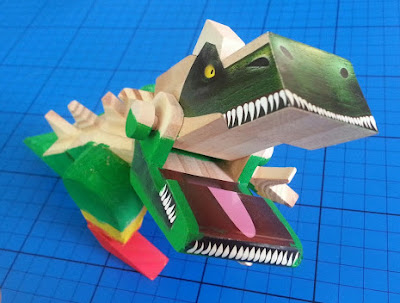 Scary ferocious dinosaur T-Rex childs model