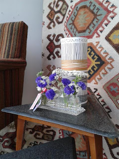 Vintage cruet with cornflowers.  Tuckshop Flowers Birmingham.  Weddings, funerals and events flowers to order.