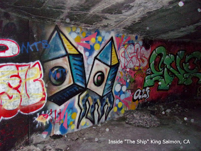 photo of graffiti in The Shipwreck an abandoned roadside attraction just South of Eureka in King Salmon