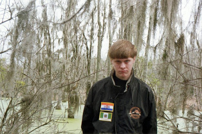 Dylan Storm Roof wore Flags of two African Nations for a Facebook shoot