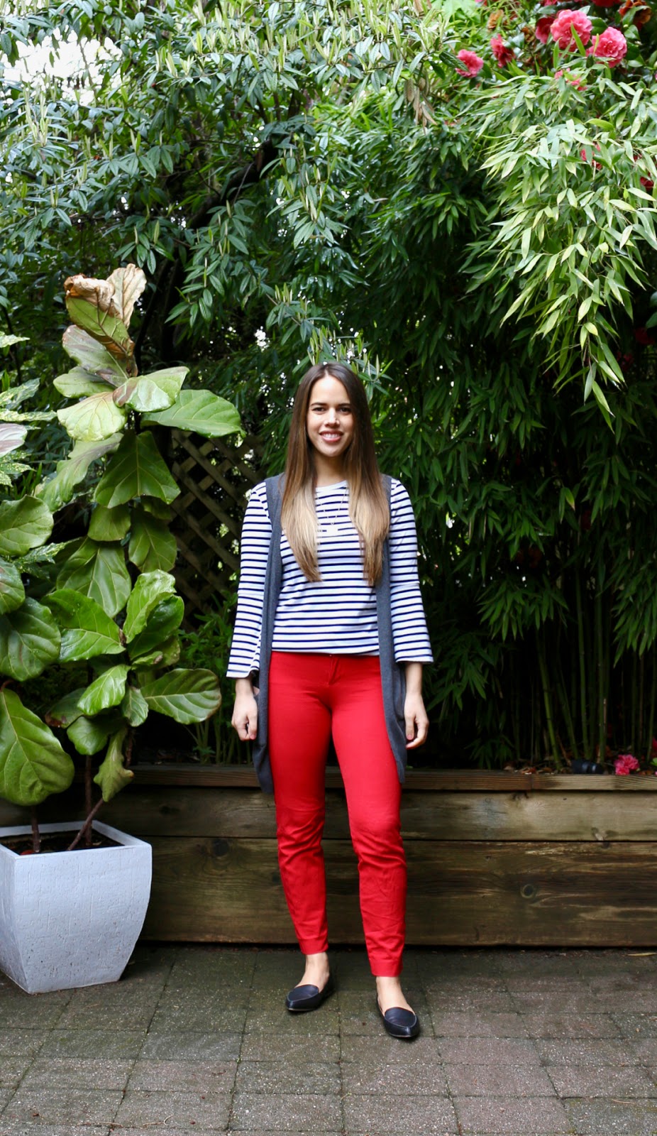 Jules in Flats - Stripe Bell Sleeve Top with Red Pants and Knit Vest (Business Casual Spring Workwear on a Budget)