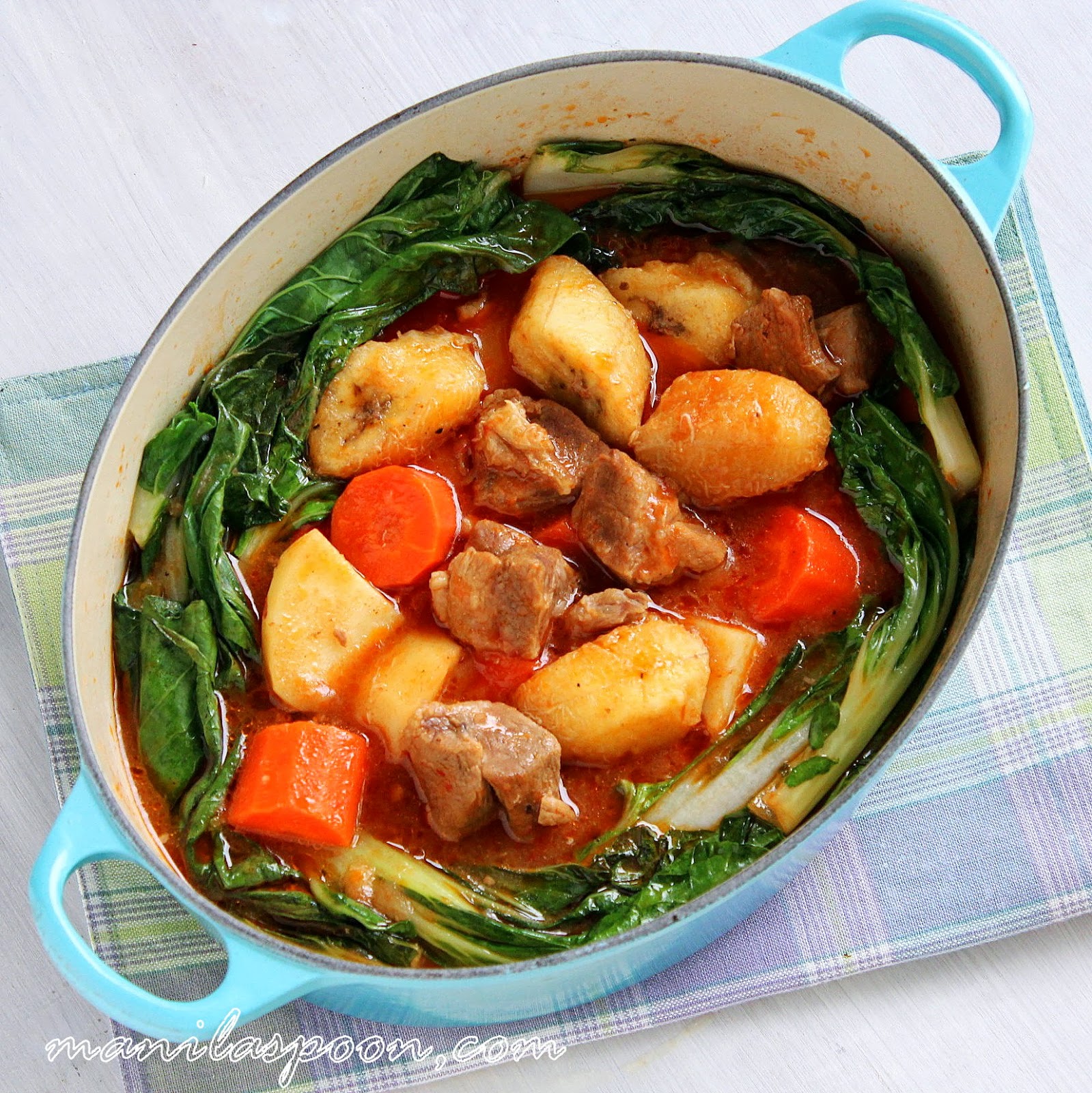 Adding bananas into this melt-in-your-mouth tender beef or pork stew brings so much flavor and richness to this Asian classic. This Filipino stew is a huge family favorite and a dish you'll make over and over again! #pochero #filipinofood #asiancuisine #pork #beef
