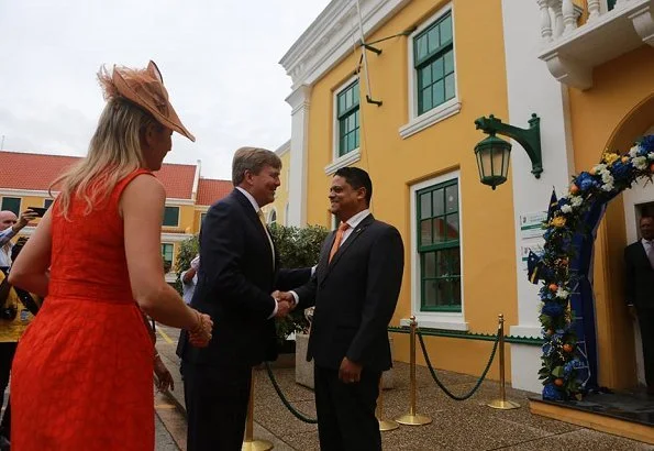 Queen Maxima- wore NATAN Dress. Governor Lucille Andrea George-Wout of Curaçao and Minister Eugene Rhuggenaath. Dia di Bandera