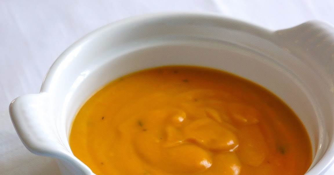 Cream of yellow split pea soup with coconut milk and savory
