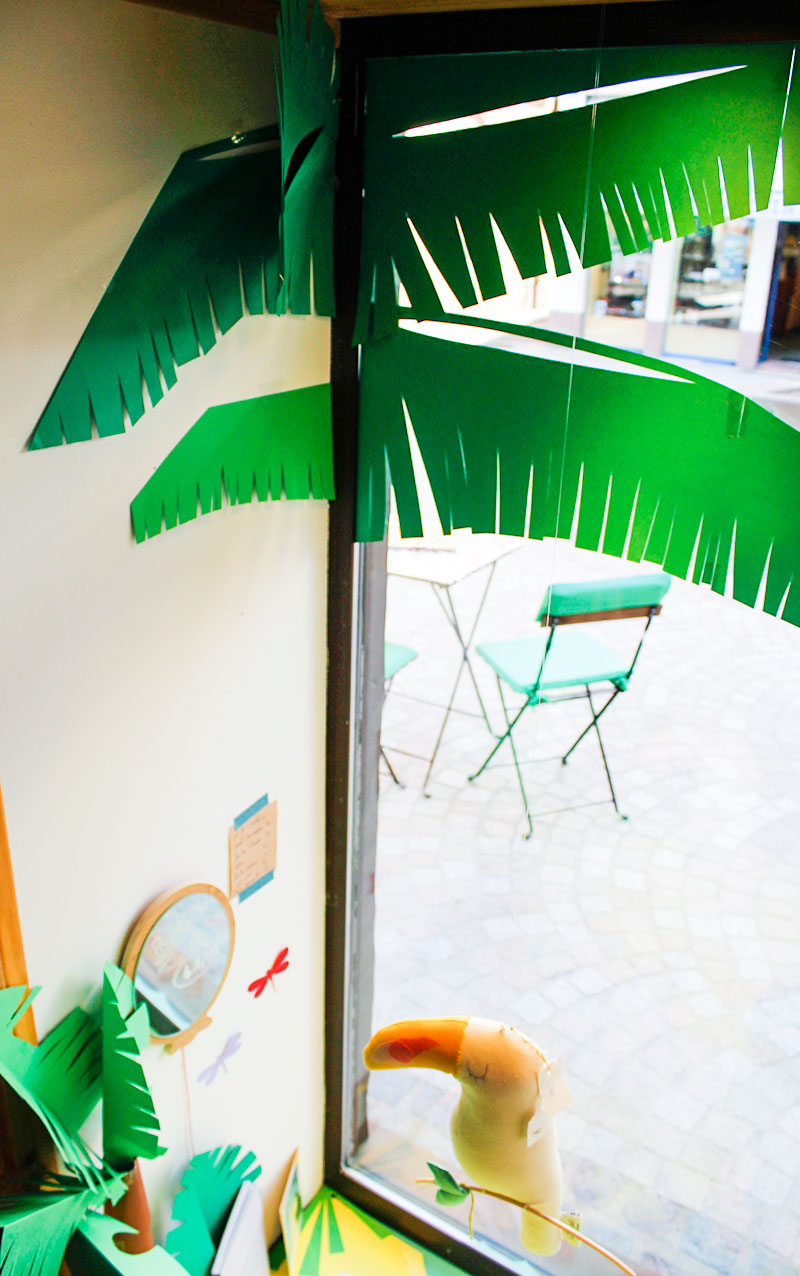 palmier paper cut window display by Camille Epplin