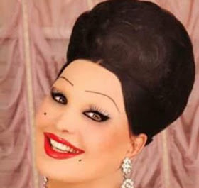 Moira Orfei rarely strayed from her trademark look, with  heavy make-up and a turban-style hairdo