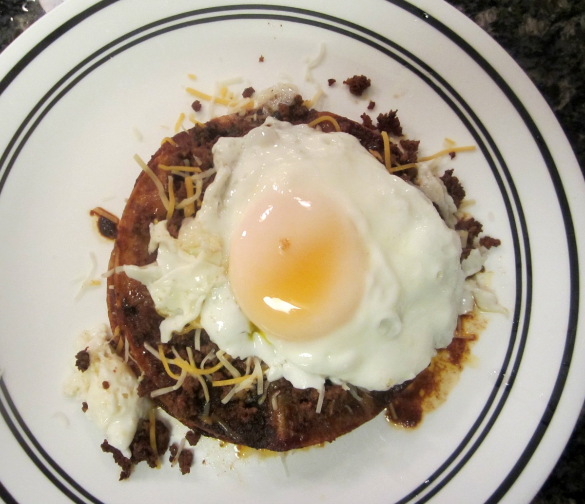 Reviews, Chews & HowTos Stacked Enchiladas with Fried Egg 