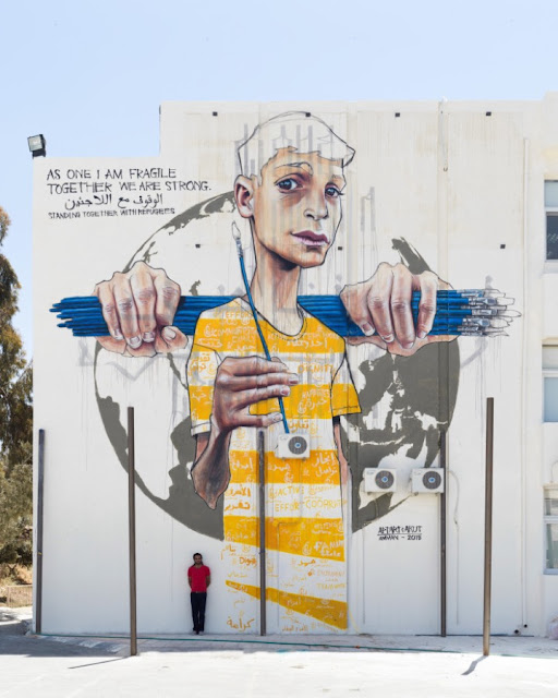 While we last heard from him a few weeks ago in Hawaii, Akut from Herakut is now in Jordan where he just finished working on a large mural in Amman.