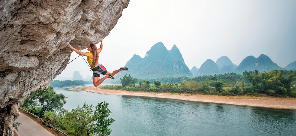 Anna Tsyganova. Climbing action.