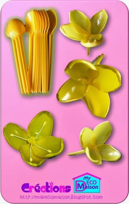 Fleur jaune faite en cuillères de plastique