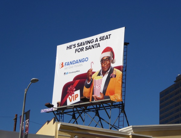 He's saving a seat for Santa Fandango Miles Mouvay billboard saving seat for Santa Fandango Miles Mouvay billboard