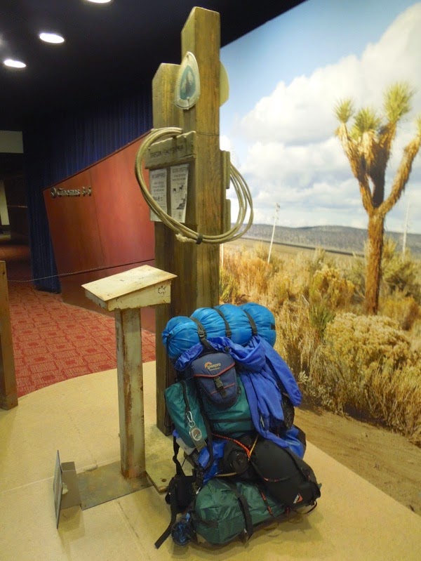Wild backpack and trail sign props