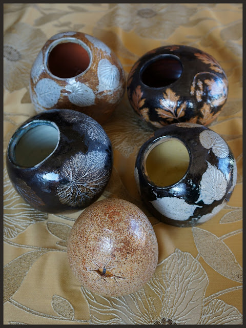 Soda fired pottery by Lily L.