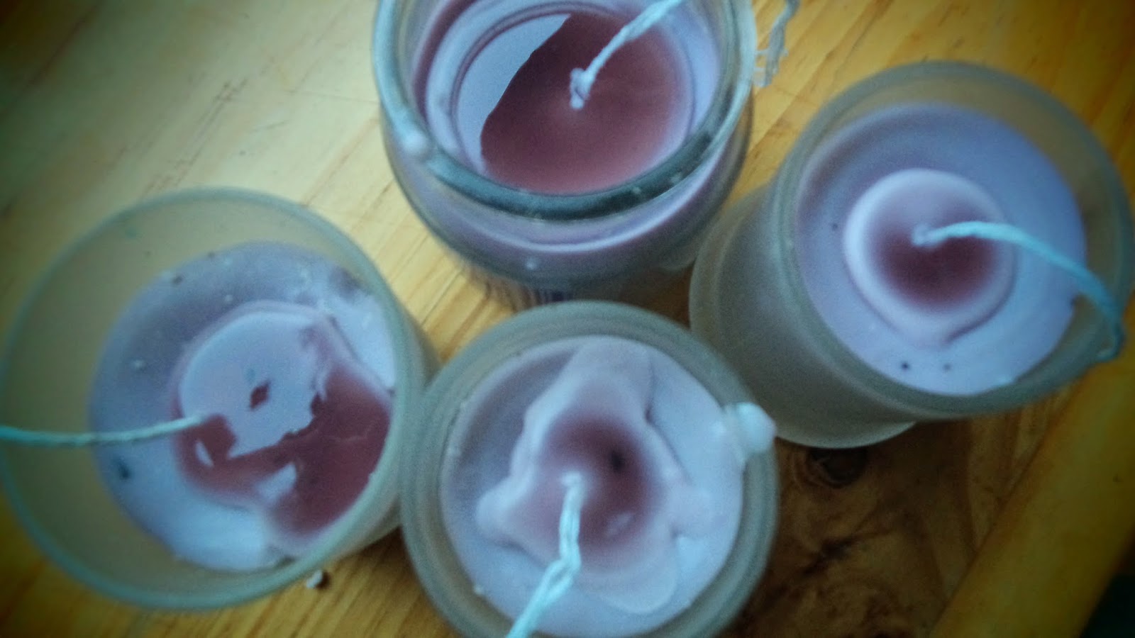 Refilling old candle holders with new home made candles!