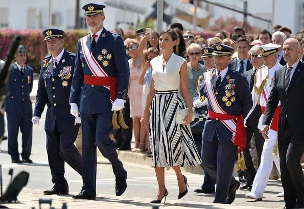Queen Letizia wore Balenciaga Striped pleated crepe skirt and Carolina Herrera high heel slingback blue pumps