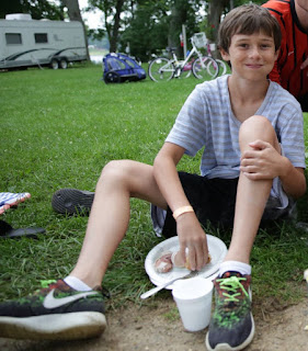 cute kid in white socks and sneakers
