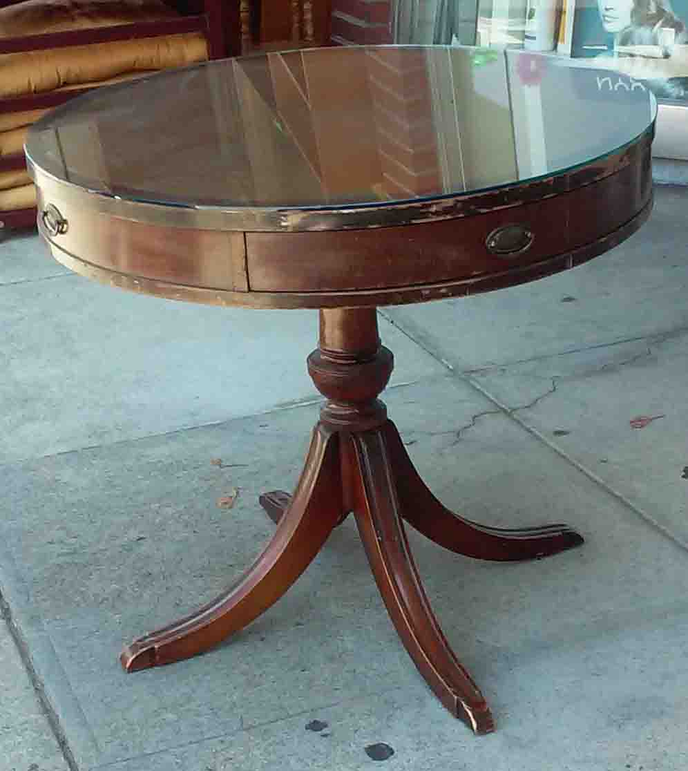 UHURU FURNITURE & COLLECTIBLES SOLD Mahogany Drum Table with Glass Top