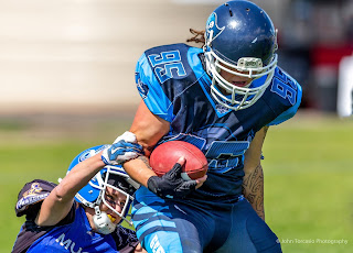   Geelong Buccaneers vs Melbourne Uni Chargers  Gridiron Victoria : Richelle Cranston being tackled by Madeline Kop