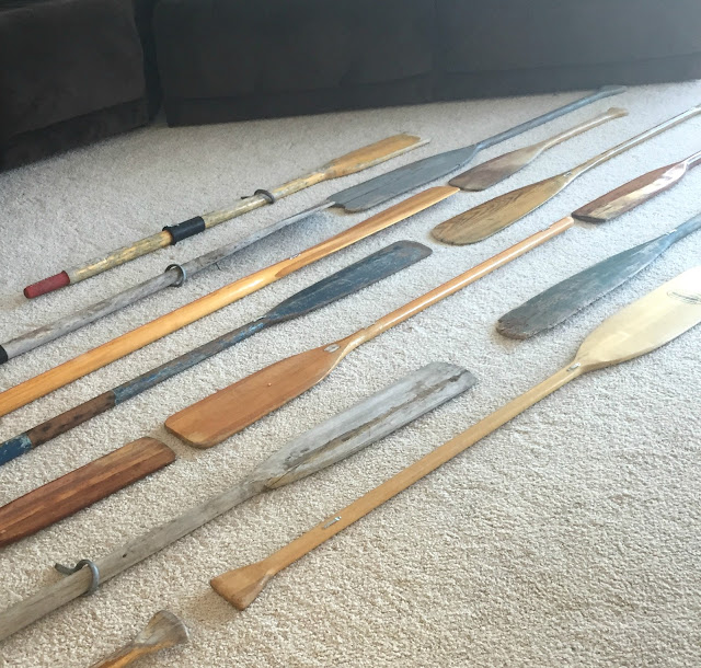 Creating an oar wall. One paddle at a time.