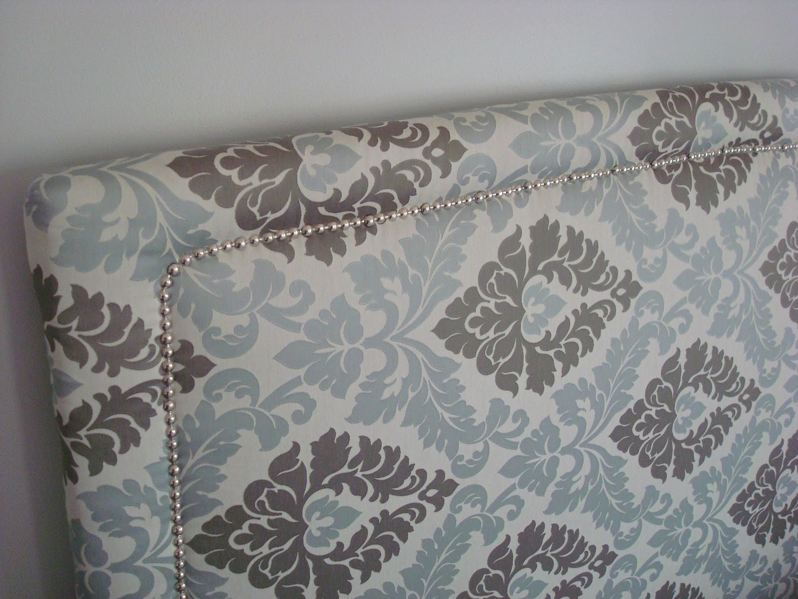 Dishing Up Design: DIY Upholstered Headboard with Nailhead Trim