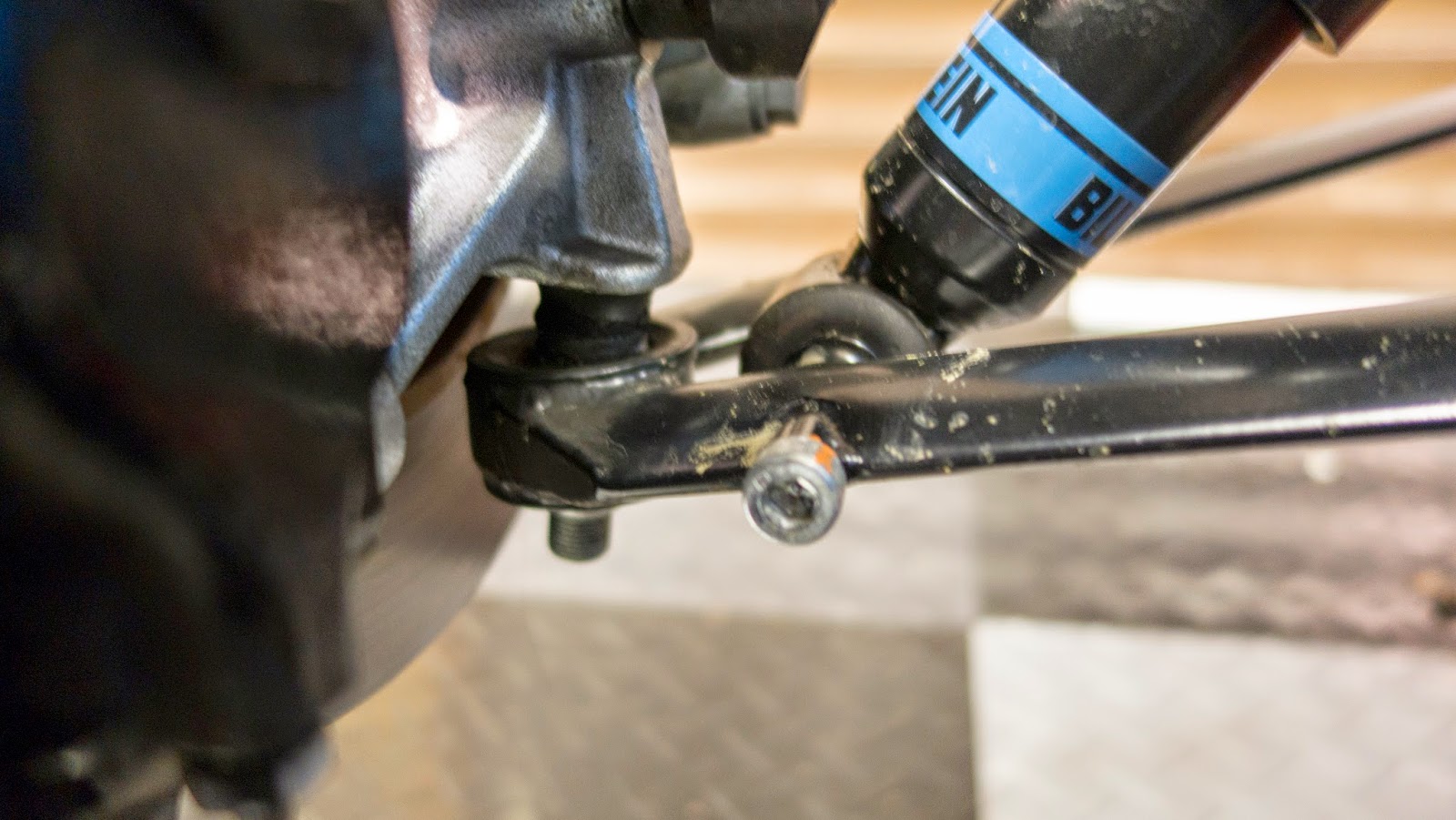 Use a 6mm Hex / Allen Key to remove the lower suspension bolt