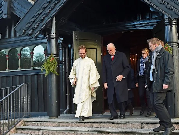 Crown Prince Haakon, Crown Princess Mette-Marit, Prince Sverre Magnus, Princess Ingrid Alexandra attend Christmas service. Crown Princess Mette-Marit wore Prada coat