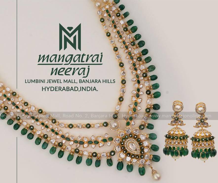 Diamond Emerald Set Jhumkas by Mangatrai Neeraj