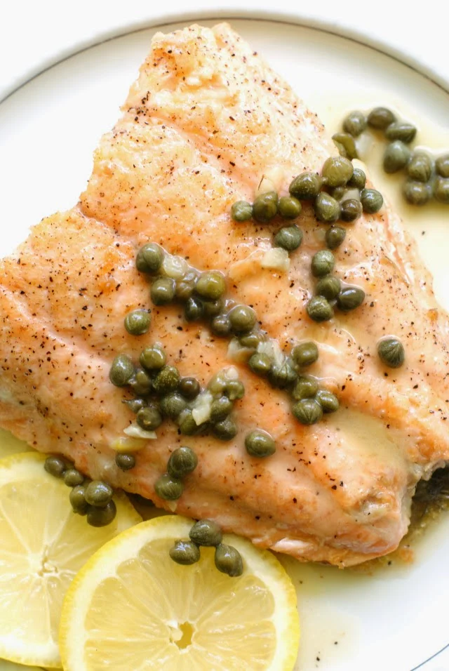 Crispy Skin Salmon Piccata made with fresh salmon and a lemon butter sauce with capers and garlic.