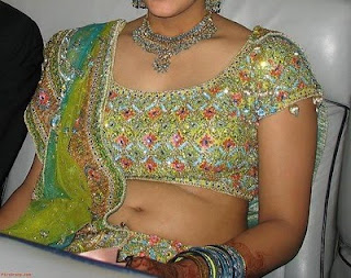 Indian girl in blouse showing belly