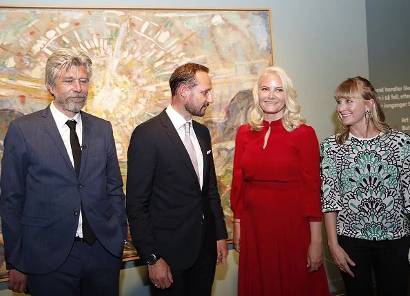 Crown Princess Mette-Marit wore a red Valentino tulle gown, Gianvito Rossi shoes and carried Bottega Vaneta gold diamond clutch bag