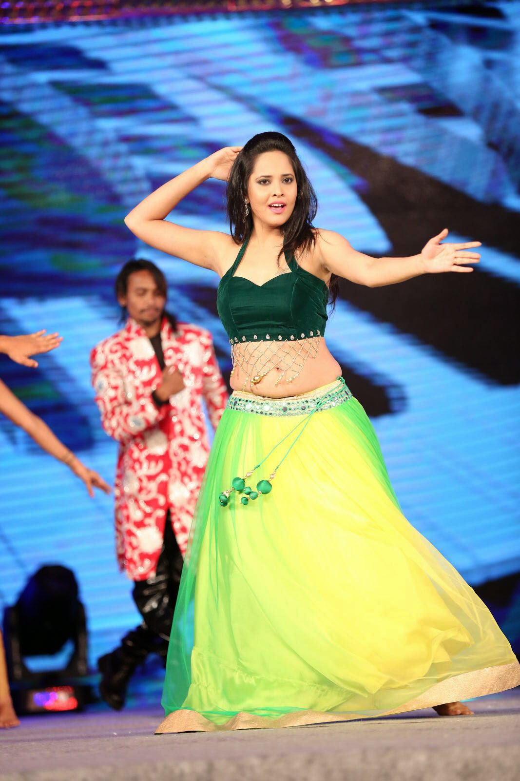 South Indian Hot Girl Anasuya Hip Navel Show Photos In Green Dress
