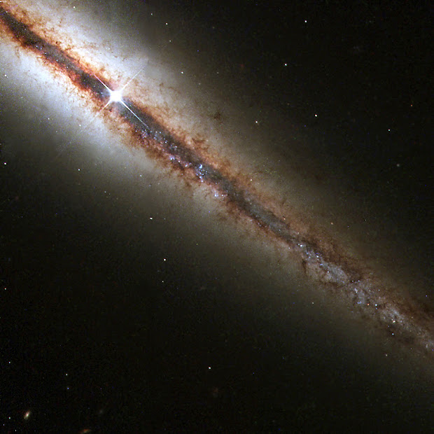 Edge-on Barred Spiral Galaxy NGC 4013 as seen by Hubble