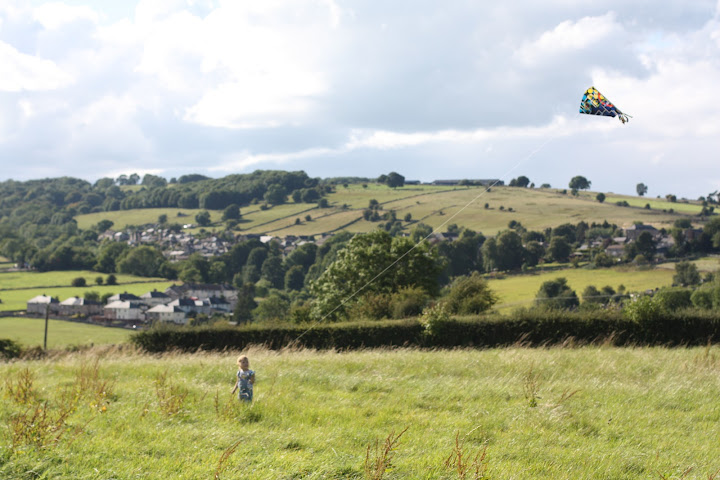 girl flying kite