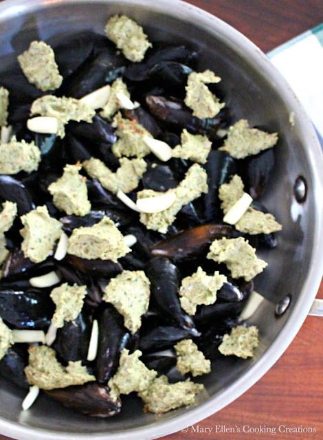 Mussels roasted in an almond butter with garlic, lemon and wine. Easy yet impressive appetizer or meal. Perfect with wine and crusty bread. Recipe via Fore Street, Portland, Maine.