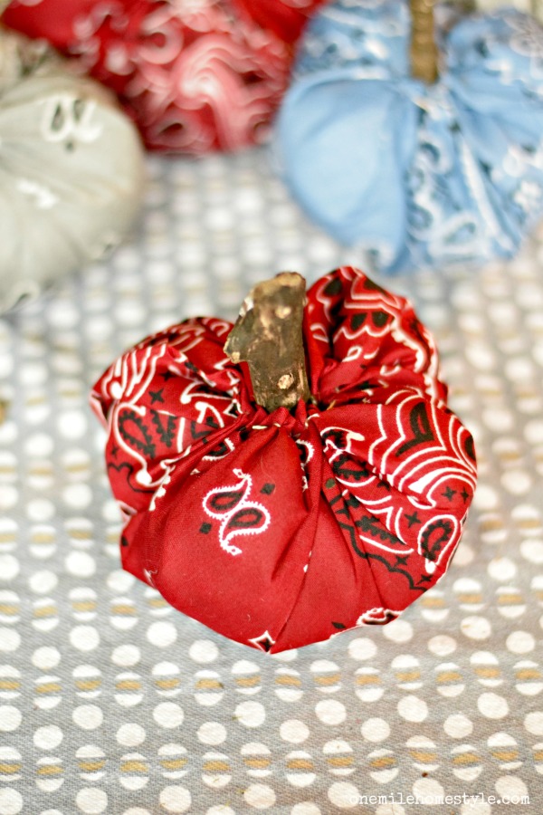 Add some color to your fall decor with these easy DIY bandana fabric pumpkins!