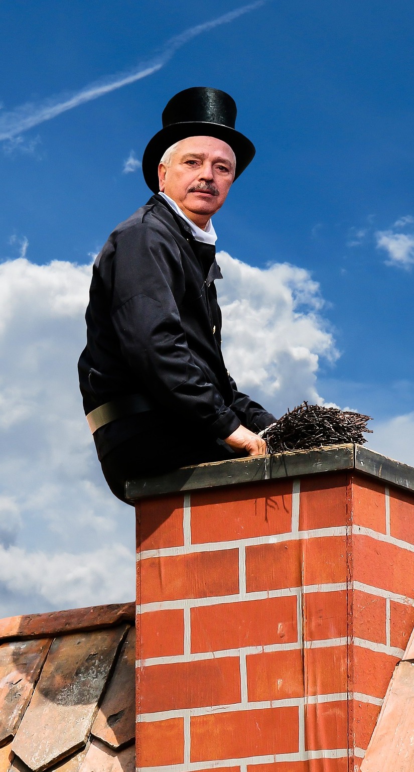 A man on a chimney. A man on a chimney.