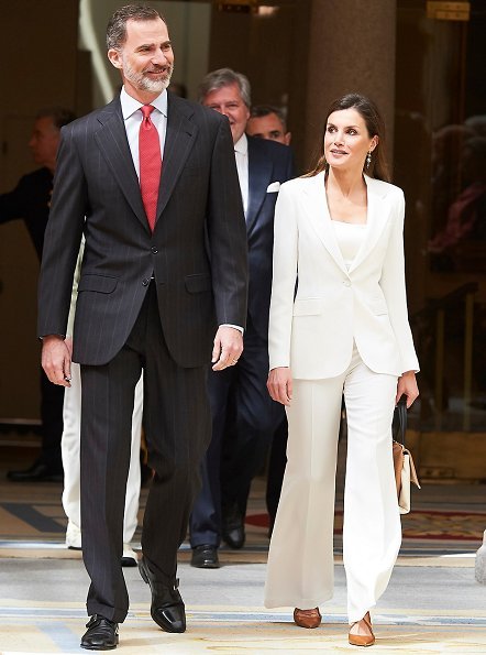 Queen Letizia carried Carolina Herrera Authentic NWT and Authenticity Card Camelot Collection Handbag, white blazer and trousers, Magrit pumps