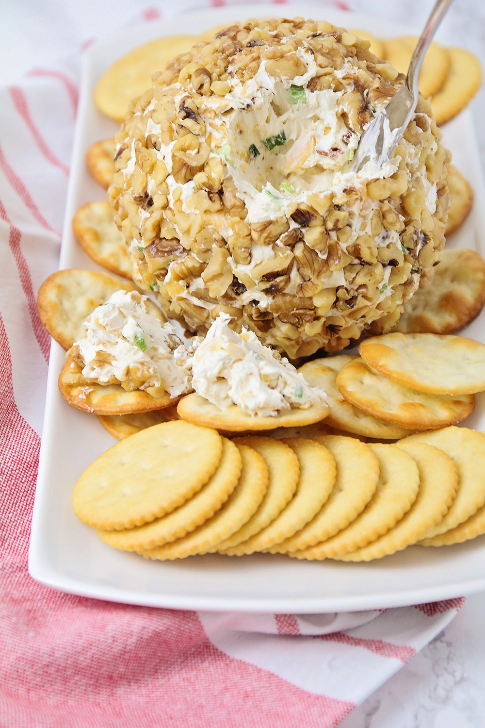 This savory and flavorful bacon cheddar cheeseball is so easy to make, and so delicious. It's the perfect party appetizer!