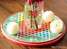 use an old game board for a simple centerpiece