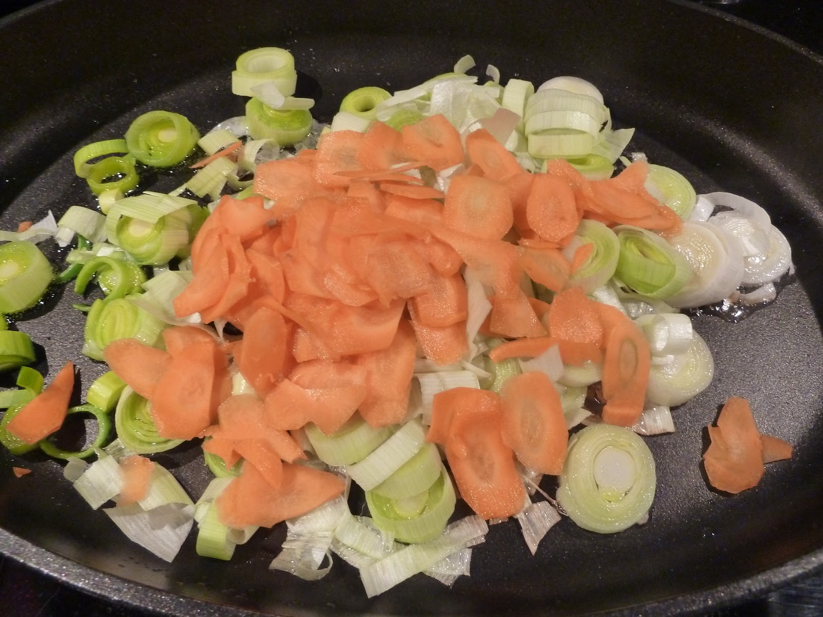 Überall &amp; Nirgendwo: Lauch-Möhren-Risotto mit Jacobsmuscheln und Scampi