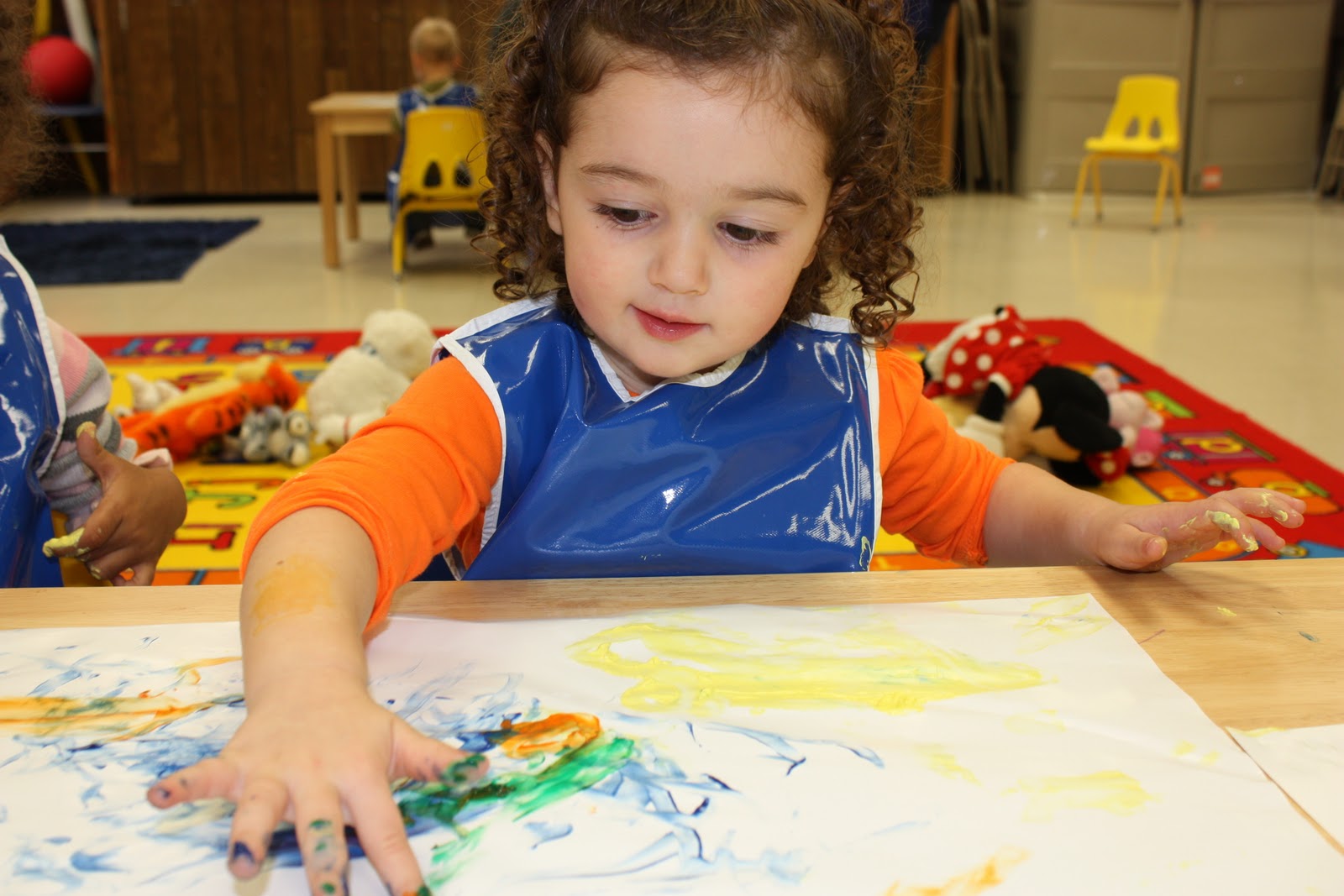 Sophia's Big Adventures Finger Painting in Art Class