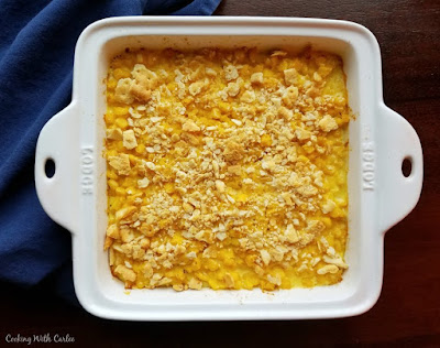 This vintage recipe is a hearty filling side dish that was a staple at many family dinners of my childhood and those of the generations before me. Great-grandma's scalloped corn is a perfect side to so many dinner entrees! square casserole dish of scalloped corn fresh from the oven