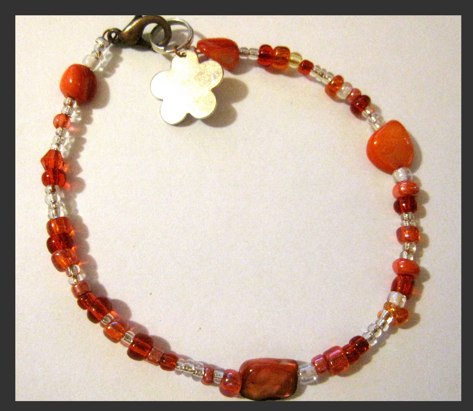 The Jade - jewelry: Red bracelet with flower tag 008