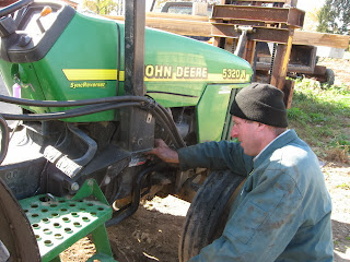 Dave inspecting tractor