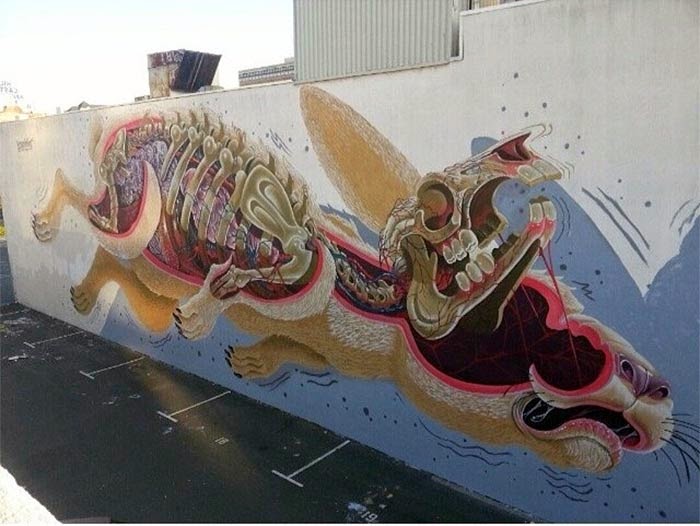 After taking over the streets of San Francisco (Part I - Part II), Nychos is now in Oakland, USA where he just finished working on this massive new piece for Easter. 1